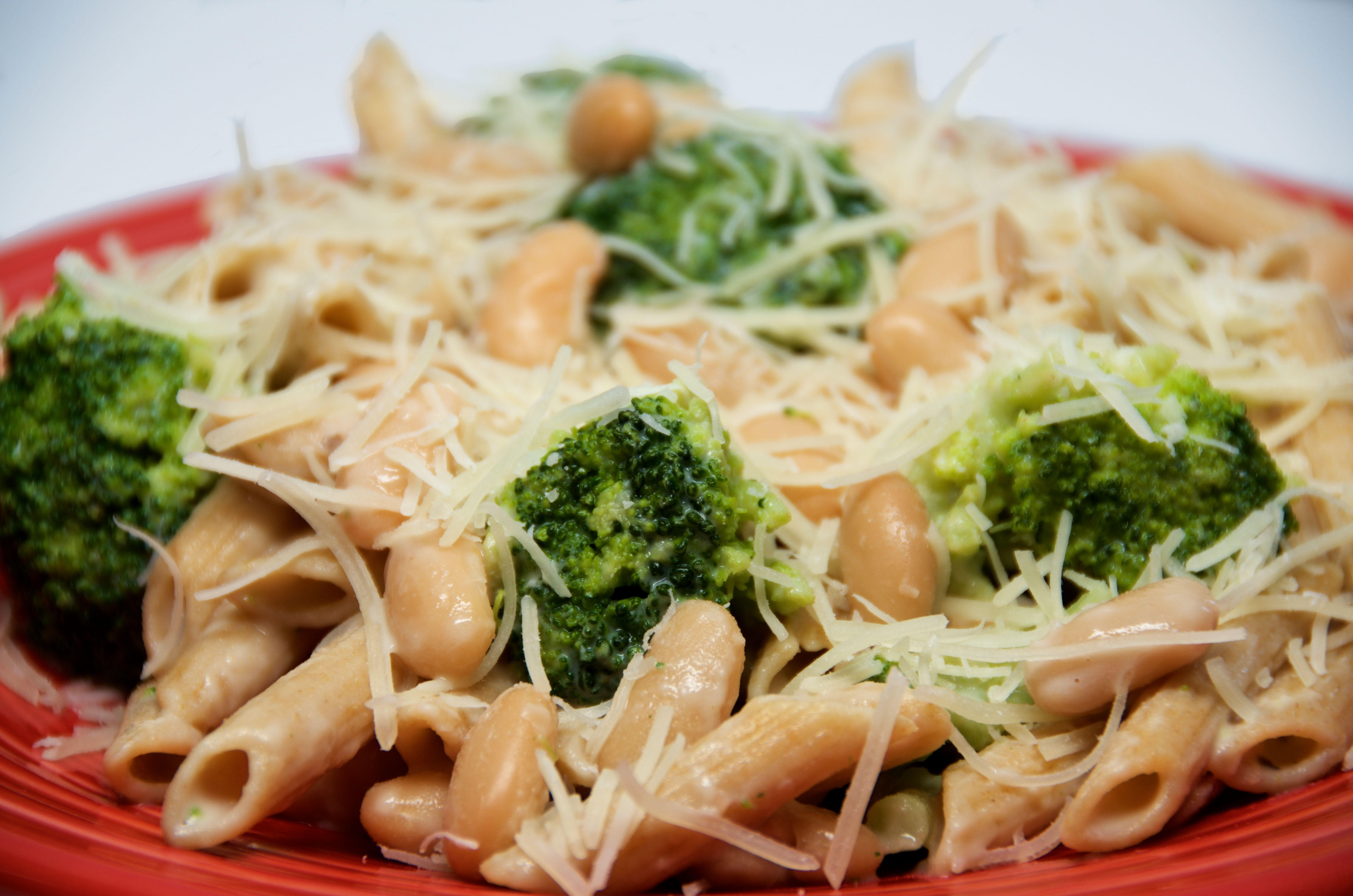 An image showcasing the Cheesy Bean and Broccoli pasta recipe