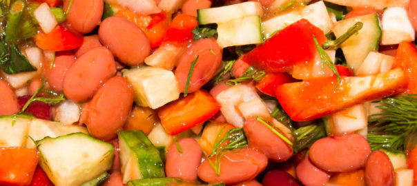 An image depicting a bean and vegetable salad.